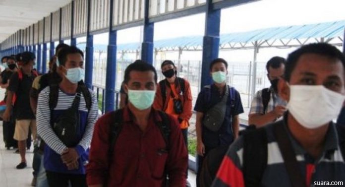 46840-ilustrasi-tki-pulang-dari-malaysia Mendagri Keluarkan Surat Edaran Terkait Pencegahan Penyebaran Bagi TKI