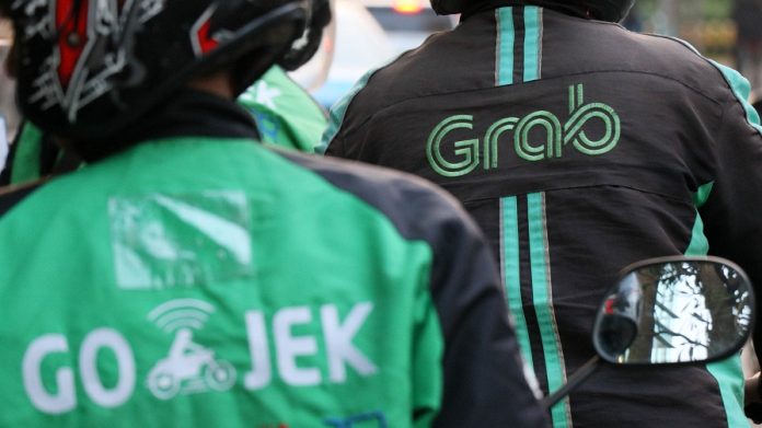 Merger Grab dan GoTo: Tantangan Regulasi dan Perlindungan Sosial bagi Mitra Ojol Merger Grab dan GoTo: Tantangan Regulasi dan Perlindungan Sosial bagi Mitra Ojol