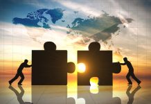 Apakah Merger Tetap Sah Ketika Merging Company Memiliki Utang Pajak?