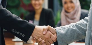 Merger Perusahaan Induk Dan Anak: Mengapa Saham Induk Dan Saham Minoritas Diperlakukan Berbeda?